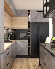 a modern kitchen with wood flooring and black appliances in the center, along with an open shelving unit