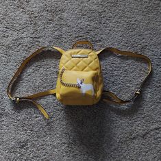 Brand New Without Tags Betsey Johnson Mini Frenchie Backpack/Handbag Mustard Yellow Floral Print Inside Silver Hardware 2 Inside Pockets Trendy Yellow Backpack Bag, Trendy Yellow Backpack-style Shoulder Bag, Yellow Satchel Backpack For Daily Use, Trendy Yellow Backpack Shoulder Bag, Trendy Yellow Backpack Style Shoulder Bag, Trendy Yellow Backpack, Everyday Yellow Backpack With Removable Pouch, Yellow Backpack With Adjustable Strap, Yellow Backpack For On-the-go