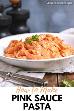 how to make pink sauce pasta in a white bowl on top of a wooden table