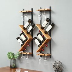 two wooden shelves holding wine glasses and bottles