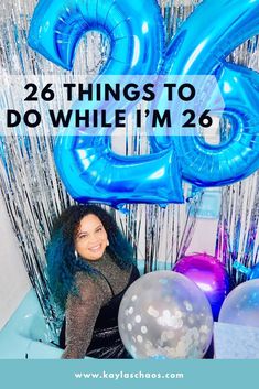 a woman sitting in front of balloons with the words 26 things to do while i'm