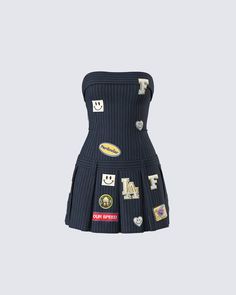 Bad b*tch vibes only 😜 Always be one step ahead of them in this navy pinstripe dress made from suiting fabric and complete with a fit & flare style, cute patches, and a pleated skirt 🖤 Pinstripe Two Piece Outfit, Short Dress With Ruffles, Women 2 Piece Outfit, Patch Skirt Outfit, Rihanna Iconic Outfits, Vintage Clothing Pieces, Strapless Dress With Shirt Underneath, Fly Outfits Women, Pisces Outfits Aesthetic