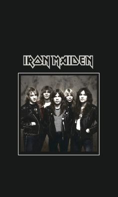 the band iron maiden posing for a photo in front of a black background with an image of