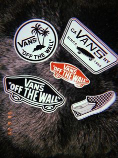 vans off the wall stickers on a furry animal's fur surface, with palm trees in the background