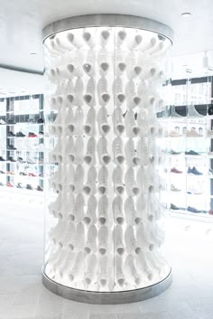 a large display case filled with lots of white objects