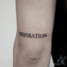 a person with a tattoo on their arm that says inspiration