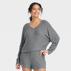 Stay effortlessly comfortable as you lounge around the house in this Cozy Ribbed Pullover from Auden™. Made from lightweight, super-comfy soft-brushed rib fabric with spandex, this long-sleeve pullover top hits at the hip. Designed with a V-neck and a relaxed fit, it's sure to be your new fave lazy-day pick. Auden™: Comfort true to every shape & hue. High Neck Tank Top, Top Hits, Rib Fabric, Target Clothes, Slim Fit Shorts, Workout Tank Tops, Knitted Tank Top, Ribbed Fabric, Women Pullover