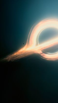 an image of a ring that appears to be spinning in the air with light coming from it