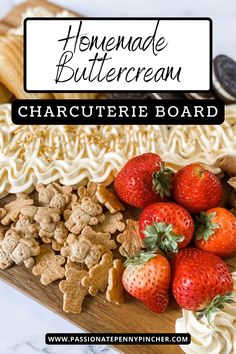 the homemade buttercream charcuterie board with strawberries and crackers on it