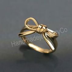 About Item  Item           :- Knot Tie Ring Ring size   :- Choose from variation( Custom size accepted) Material   :- Sterling silver Purity  :- 92.5 Item Title :- Silver Knot Bow Tie Ring, Dainty Ribbon Ring, Minimalist Band, Everyday Stacking Ring, Tiny bow Ring, Gift for Her, Bow Jewelry,Women's ring Description:- We use 925 sterling silver & 14K pure gold to making jewelry. We accept all types of custom & personalized order. Please send us a message if you are interested in a custom creation.  Shipping profile :- We ship all order within 3-5 days. But custom order takes time. Customer service:- If you have any question about our products & services, feel free to contact us. We do always best for our customers. Thanks & Regards, HandmadejeweleryCo. Bow Tie Ring, Tie Ring, Ribbon Ring, Knot Bow, Knot Tie, Tiny Bow, Bow Ring, Bow Jewelry, Ring Minimalist