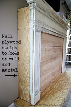 an unfinished fireplace surround with the words nail plywood strips to 3x5's on wall and mantel