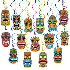 a group of colorful masks hanging from strings