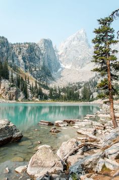 a mountain lake surrounded by rocks and trees