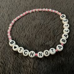 Taylor Swift Eras Tour Themed Friendship Bracelet. Made From Glass And Plastic Beads And Stretchy Elastic Band. Fits Most Teen And Small Adult Wrists. Great For Gifting Or Trading! “B*Tch Not A Baller” Lyrics From “The Man” Spelled Out Next To Pink And White Beads. Bundle With Other Bracelets For Best Deal. Custom Orders Available Upon Request! Taylor Swift Friendship Bracelet Eras Tour You’re On Your Own Kid (Yoyok) Trading Gift Swiftie Fan Swiftie Fan T Swizzle Bracelet, Bejeweled Friendship Bracelet, Eras Tour Bracelet Ideas Lyrics, Era Tour Bracelets Ideas, Unhinged Taylor Swift Bracelets, Eras Tour Bracelet Ideas, Taylor Swift Friendship Bracelet Ideas, Friendship Bracelets Taylor Swift