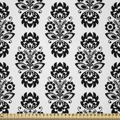 seamless black and white floral pattern on a white background, suitable for wallpaper