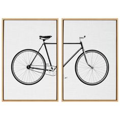 two framed black and white pictures with a bicycle on the front one has a seat