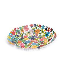 a multicolored bowl with flowers on it