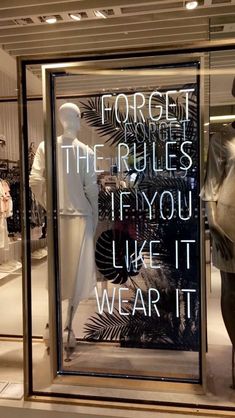 a window display with mannequins in it and the words forget the rules if you like it, wear it