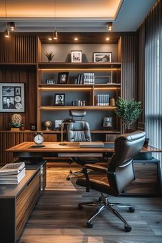 an office with wooden shelves, leather chairs and a desk in front of a window