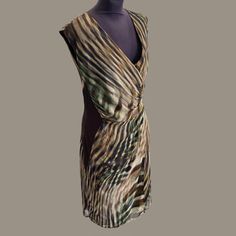 Early 2000's  "Ronen Chen" vintage bias cut sleeveless dress in rich warm tiger print with a green touch. Cowl draped detail at neckline.  long back zipper, flattered brown waistline. size : 3 (M/L, mannequin is size medium which is Euro 38, and the dress is a bit loose on it) measurements: -------------------- Length: 100 cm / 39.5" Armpit to Armpit: 45 cm / 17.5" Waist circumference: 80 cm / 31.5" Hips circumference: 100 cm/ 39.5" dress is in a very good vintage condition. -------------------- Tiger Dress, Elegant Midi Dress, Rouched Dress, Dress Y2k, Elegant Midi Dresses, Vintage Elegant, Tiger Print, Dress Clothes For Women, Deep V Neck