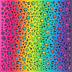 a rainbow colored background with skulls on it