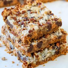 two pieces of chocolate chip cookie bars stacked on top of each other