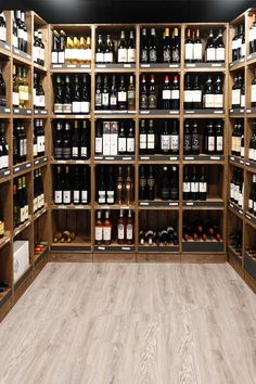 a wine store with shelves full of bottles