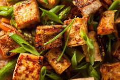 tofu and green beans stir fry in a wok