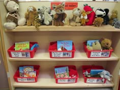 a book shelf filled with lots of stuffed animals