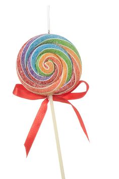 a colorful lollipop on a stick with a red ribbon