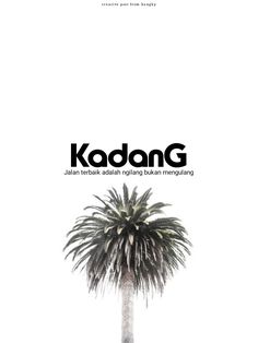 a palm tree with the words kadang in black and white on it's side