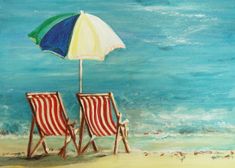 two chairs and an umbrella on the beach