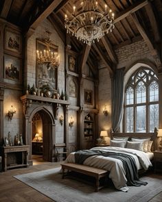 a bedroom with a fireplace, bed and chandelier