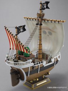 a model pirate ship with an american flag on it