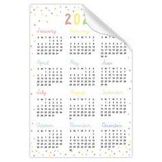 a 2013 calendar sticker with colorful confetti and polka dots on white paper