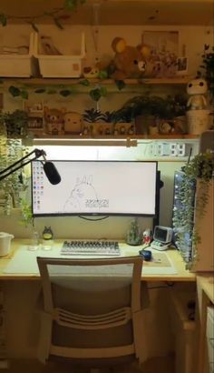 a computer desk with a monitor, keyboard and mouse on it in front of shelves