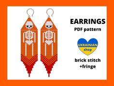 two orange and white beaded earrings with skulls on them, one has a skull in the