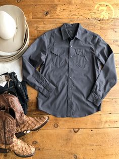 Men's charcoal long sleeve pearl snap shirt. Hidden pen slot. By Kimes Ranch. Brazil Men, Workwear Boots, Capsule Wardrobe Basics, Kimes Ranch, Hit The Floor, Pearl Snap Shirt, Ranch Wear, Western Life, Jumpsuit Shorts Rompers