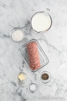 ingredients to make meatloaf laid out on a marble counter top