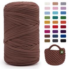 a spool of yarn next to a bag and color swatches for the knitting project