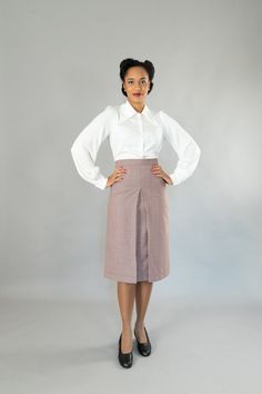 Wide-cut, calf-length skirt with a wide waistband in 40s style. It has a deep box pleat at the front and back. The skirt is lined, All models are made in my studio in Berlin. Outer fabric: 100% virgin wool Dry cleaning Size 34: Bust 80 cm, waist 64 cm, hips 86 cm Size 36: Bust 84 cm, waist 68 cm, hips 90 cm Size 38: Bust 88 cm, waist 72 cm, hips 94 cm Size 40: Bust 92 cm, waist 76 cm, hips 98 cm Size 42: Bust 96 cm, waist 80 cm, hips 102 cm Size 44: Bust 100 cm, waist 84 cm, hips 106 cm Size 46: 40s Skirt, 40 Rocks, 40s Mode, 40s Blouse, 40s Dress, Calf Length Skirts, Big Shirt, 40s Fashion, High Quality Dress