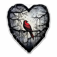 a heart shaped sticker with a red bird sitting on a branch in the middle