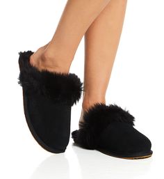 Shoe 8 This fun, youthful slipper takes the style of the ever-popular Scuffette and adds a wild, furry statement. Match your personality with a sophisticated basic color or a bold fashion option! Made of wool and recycled polyester. Smooth genuine suede upper has UGG logo stamped onto out-facing side. Fluffy fur collar around opening of scuff, with fully lined interior. Molded rubber outsole has a recessed pattern for grip and traction. Woven logo tag inside footbed at heel. Artificially dyed an Ugg Scuff Sis, Feather Slippers, Sleep And Loungewear, Logo Tag, Logo Stamp, Basic Colors, Fur Collars, Fur Collar, Ugg Shoes