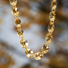 This Marie-Hélène de Taillac necklace is the perfect pop of color for everyday. The faceted ovals of warm, sunshine yellow are connected by a thin ring of 20K yellow gold creating a continuous, mesmerizing strand that is finished with a 20K yellow gold spring ring clasp closure. Wear it alone or layered with your other fancy favorites. India Inspired, Green Topaz, Sunshine Yellow, Precious Jewelry