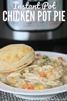 an instant pot chicken pot pie on a plate next to a crock - pot