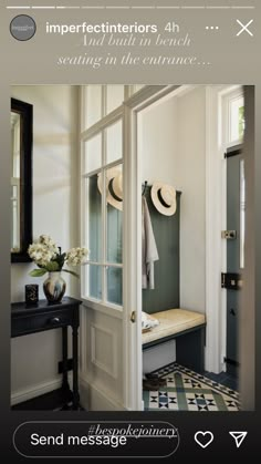 the inside of a house with an open door and some hats hanging on the wall