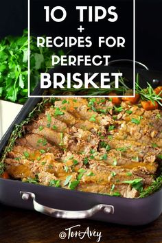 a casserole dish filled with meat and vegetables on top of a wooden table