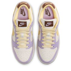 Leather upper Padded/Low-cut collar Perforated toe box Lightweight/Responsive foam midsole Rubber outsole Extra laces included Color: Lilac Bloom/Soft Yellow/Sail/Coconut Milk Style: FB7910-500 Preppy Shoes, Pretty Shoes Sneakers, All Nike Shoes, Womens Air Jordans, Cute Nike Shoes, Hype Shoes, Cute Nikes, Soft Yellow, Swag Shoes