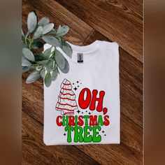 Super Cute Tee. On Gildan Adult Unisex 50/50 White Tee Shirt. Made With Sublimation. Ships Within 3 Business Days. Check Out My Page For More Listings! Message Me For Any Questions! Christmas Tree Cake Shirt, Christmas Tree Cakes, Christmas Cricut, White Tee Shirt, Oh Christmas Tree, Christmas Tree Shirt, White Tee Shirts