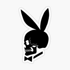 a black and white sticker with an image of a rabbit skull in the shape of a human head